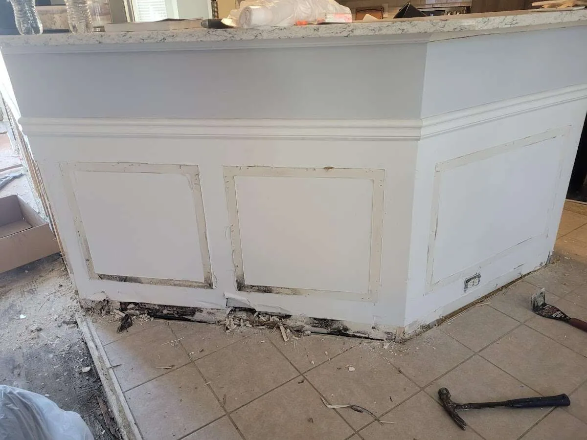 Water damage and mold on kitchen during Storm Damage Restoration in Wakefield